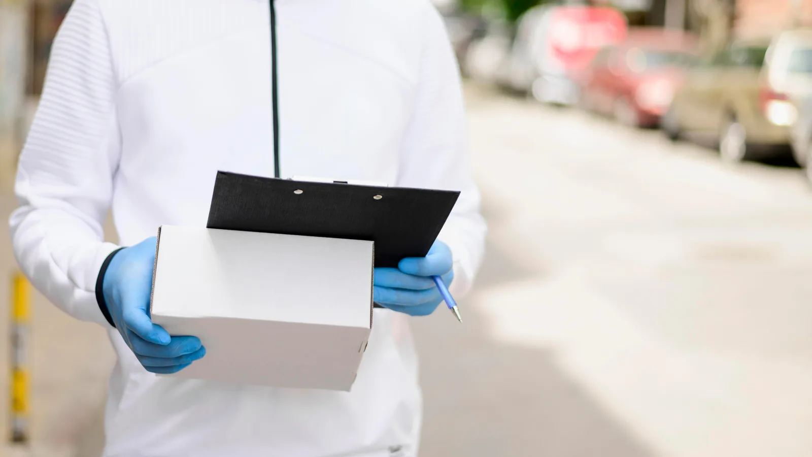 A tempaid team member preparing a temperature-controlled shipment