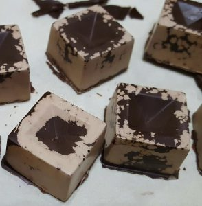 Chocolate blooming - fluctuations or moisture during manufacturing, transit, or storage